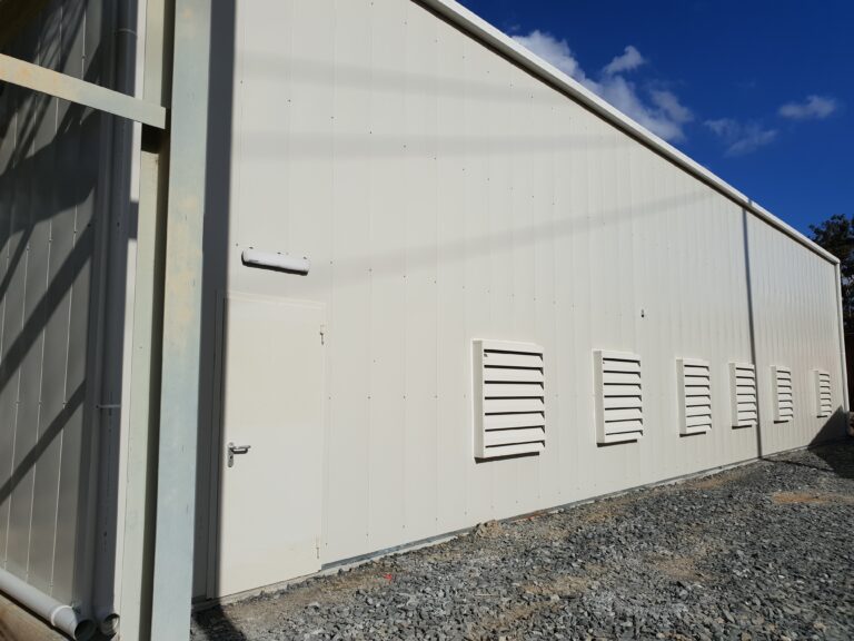 Flexshield Sonic Access Personnel access door and Sonic Series acoustic louvres installed on an acoustic shed