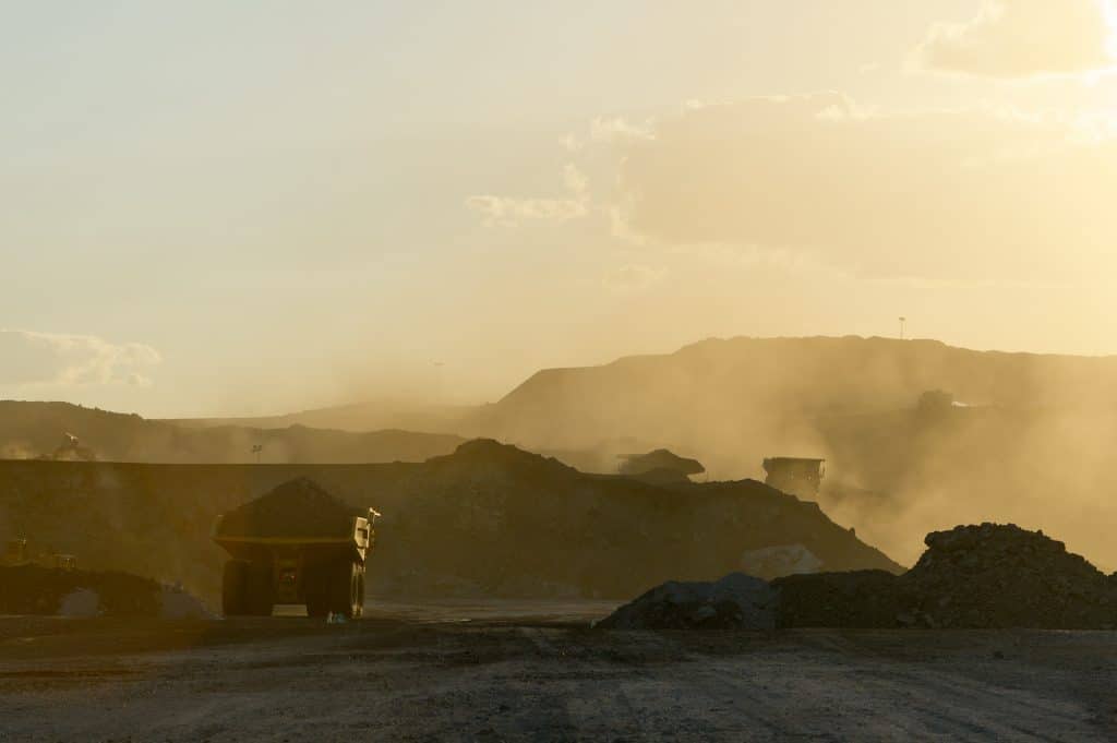 Coal mining truck hauling dirt 
