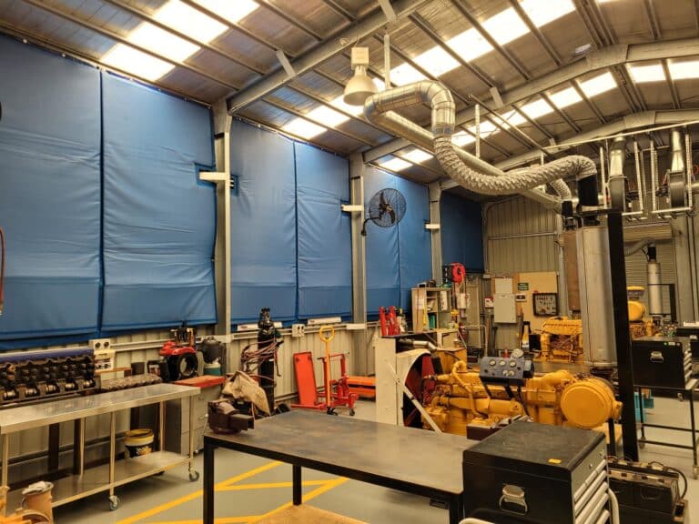 Sonic Curtain lining the walls in a welding space
