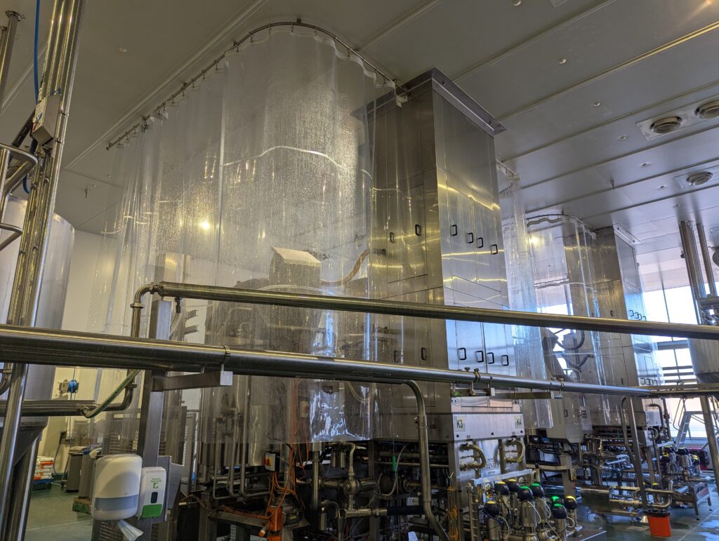 SonicClear sheet curtain protecting equipment and mess