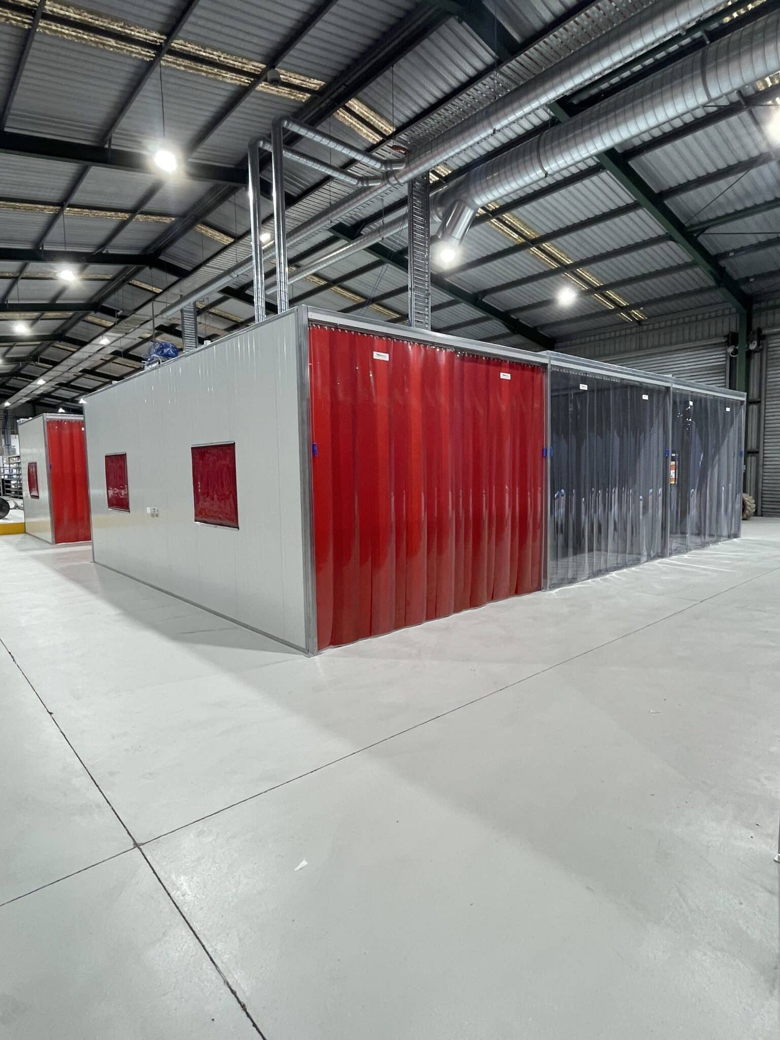 Flexshield Weldflex and SonicClear Strip curtains on an acoustic welding and grinding bay