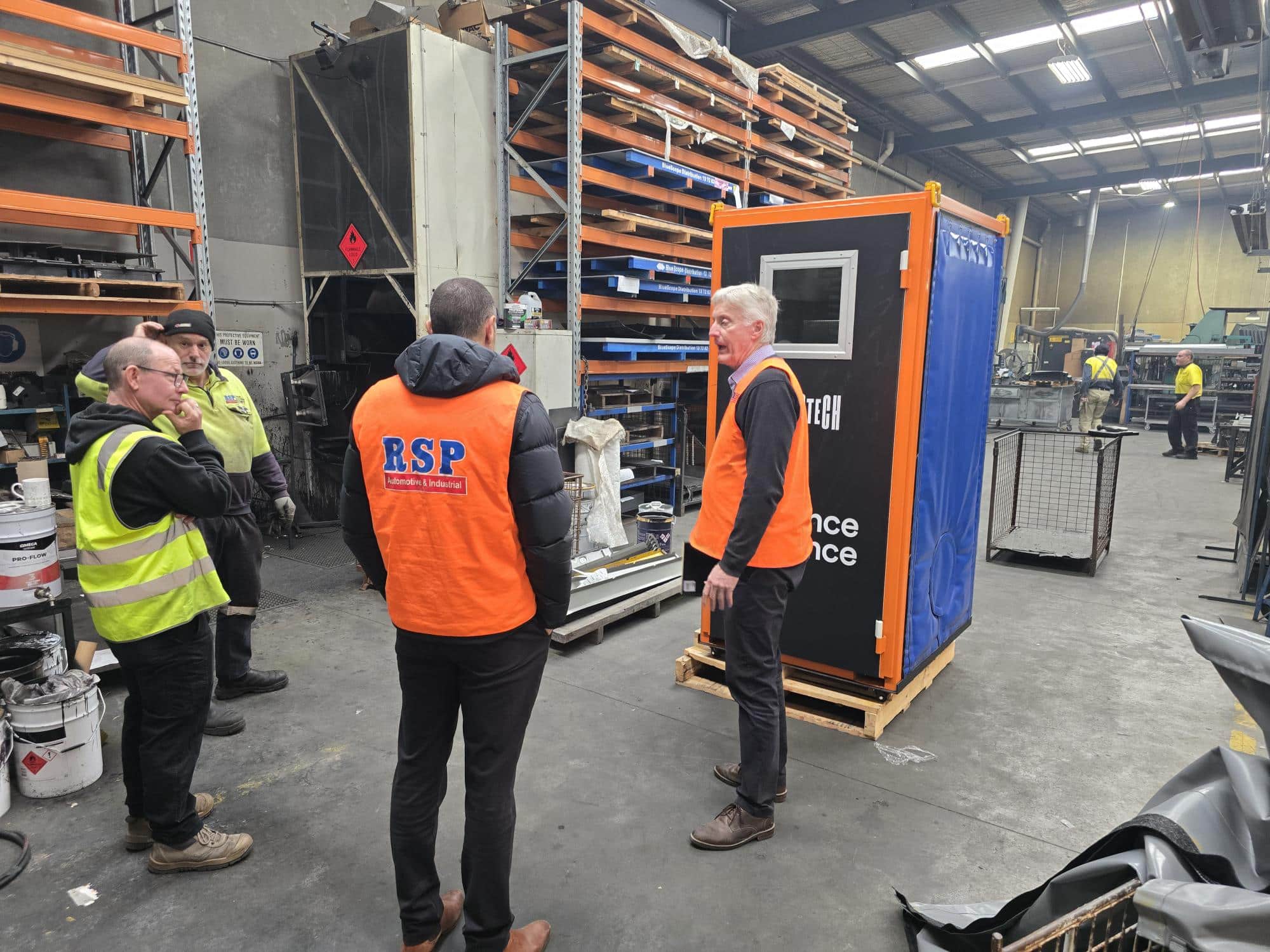 Group of Flexshield customers viewsing the Flexshield sample box