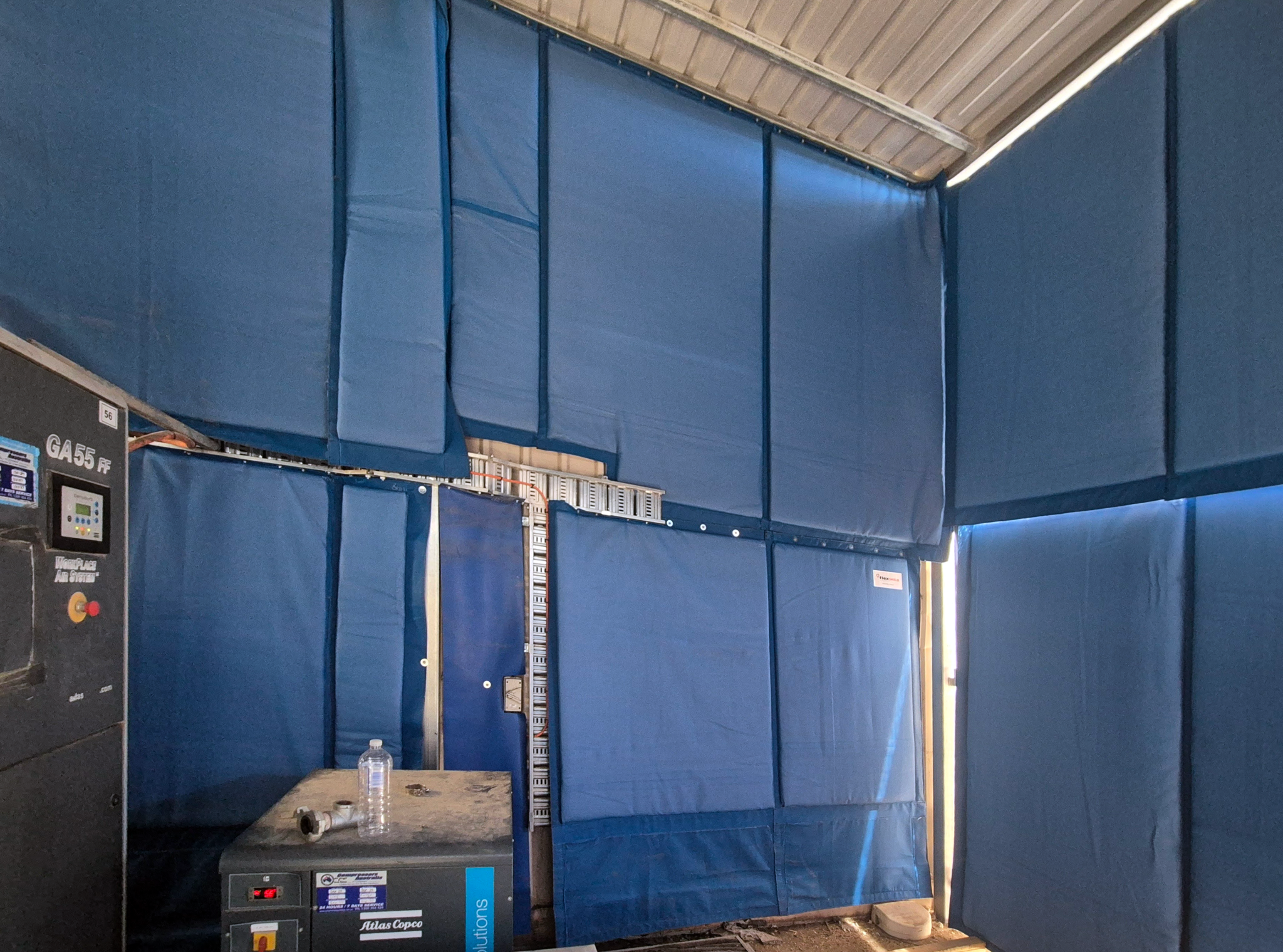 Sonic acoustic curtain wall