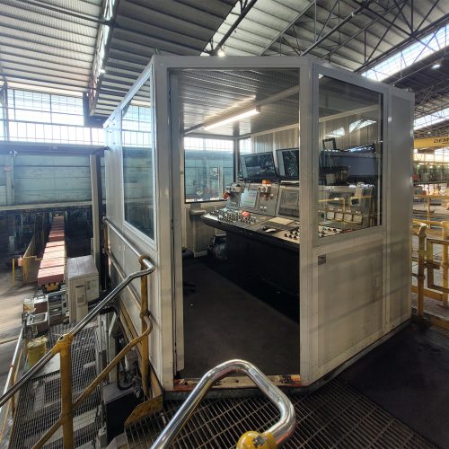Flexshield acoustic control room overlooking an industrial processing area