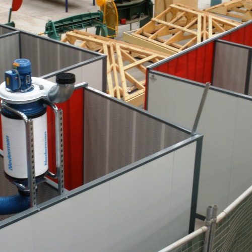 Flexshield acoustic welding bays with Sonic System acoustic modular panel walls, red Weldflex™ strip curtains and fume extraction.