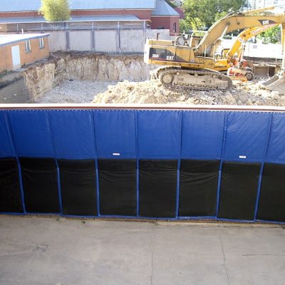 Flexshield Flexible noise barrier - sonic curtains on a construction site