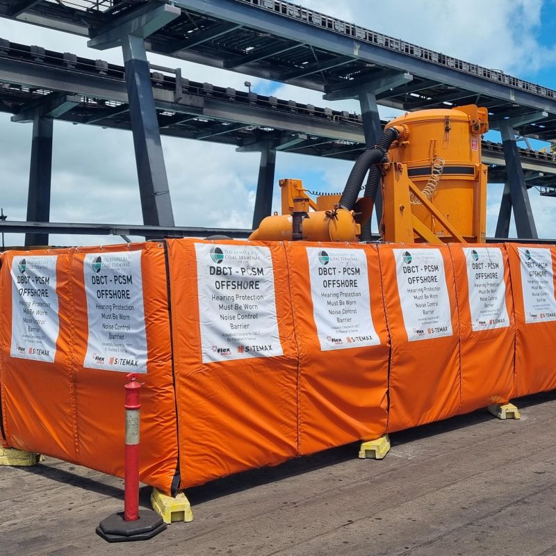 Orange Sonic acoustic quilts for construction noise.