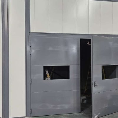 Purpose-built Sonic System enclosure controls Westrac arc spray noise while protecting staff from sparks and airborne particles.