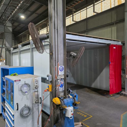 Flexshield acoustic welding bay with Weldflex PVC strip curtain, Sonic System acoustic modular panels and workshop equipment at Queensland Rail.