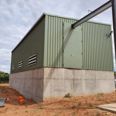 A Flexshield Sonic Access Acoustic double door with penetration for a gantry crane installed at a winery to stop noise from a pump disrupting local residents.
