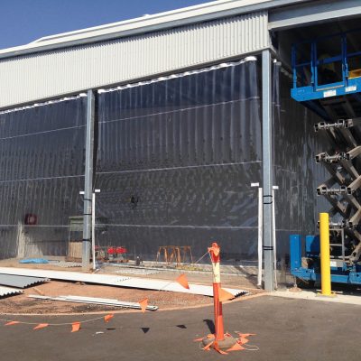 Custom-made Flexshield SonicClear wash bay curtains for Defence Barracks in Darwin.