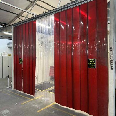 Flat clear PVC strips, 200mm wide, pre-punched and overlapped for seamless integration into existing systems.