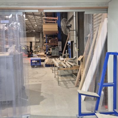 Fixed and sliding PVC panels installed with heavy-duty aluminium track and stainless steel fixings.