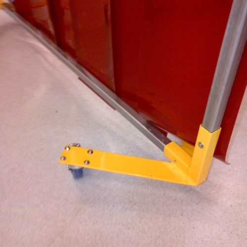 Close-up of yellow support foot and castor on a Weldflex™ mobile screen
