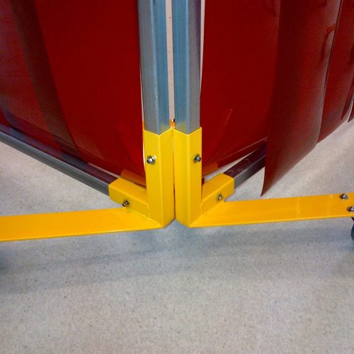 Two Weldflex™ mobile screens joined at a right angle on castors