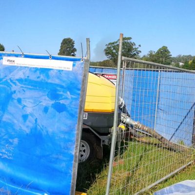 Temporary Hire Curtains can be attached to temporary fencing on site